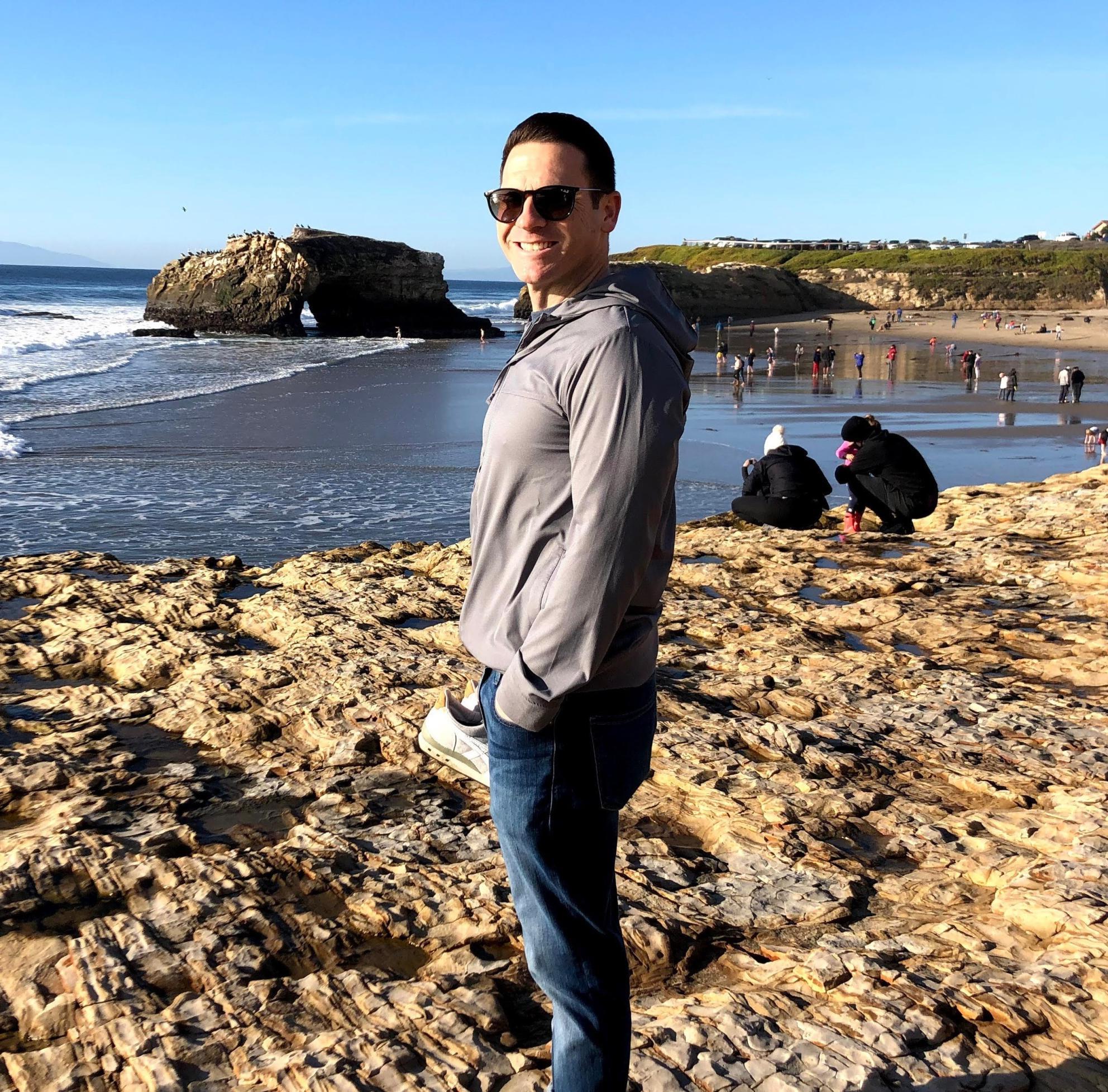 Colby Sneed on a beach